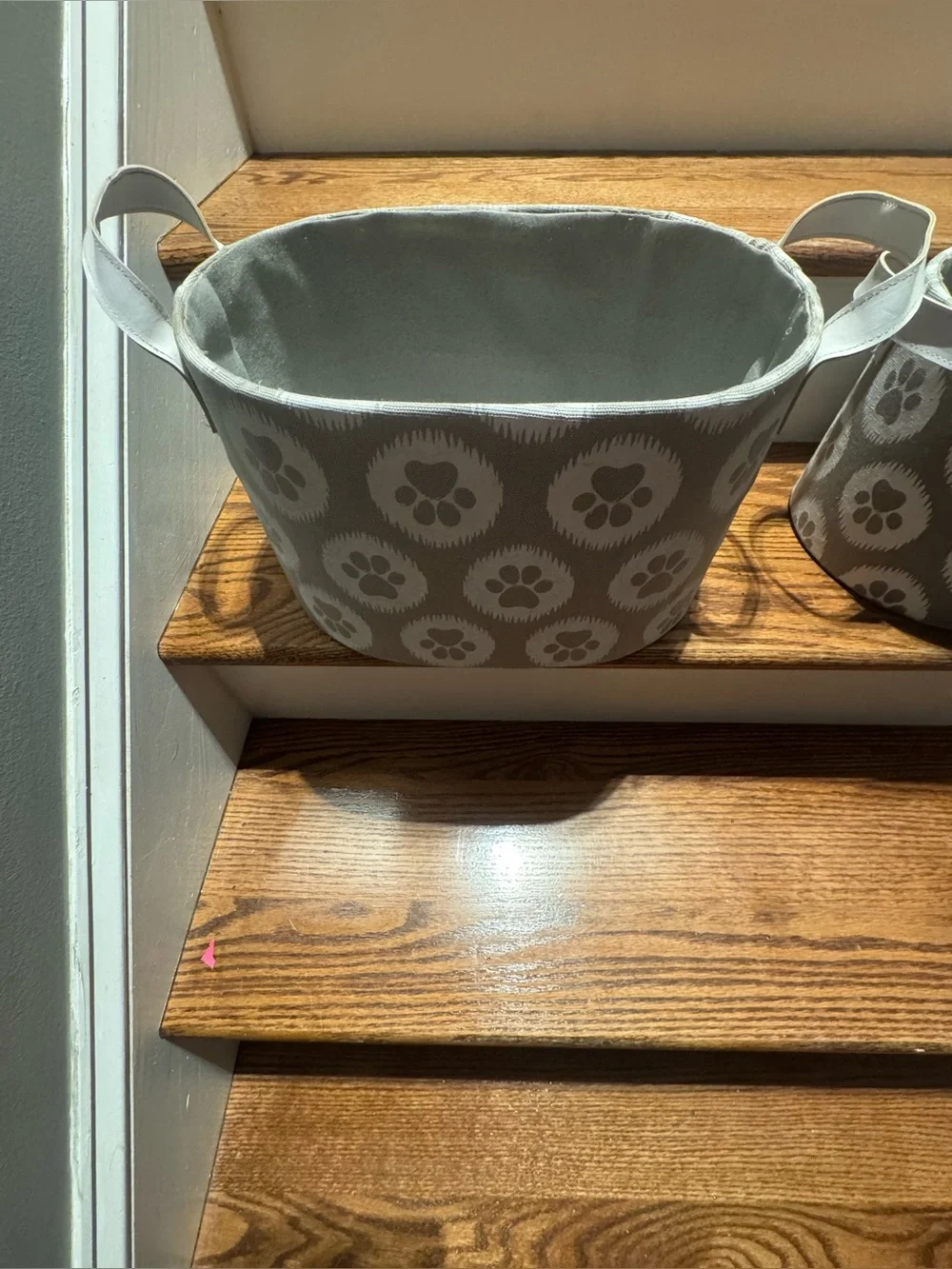 Set of gray & white paw print canvas storage baskets with white leather handles